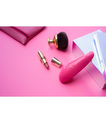 Вакуумний кліторальний стимулятор рожевого кольору Womanizer Muse - 5