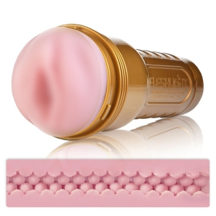 Мастурбатор в колбе вагина рельефный телесного цвета Fleshlight